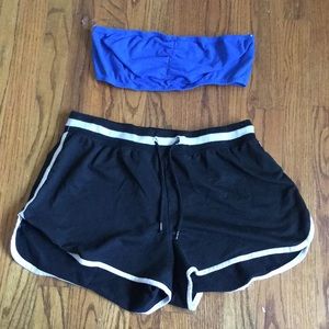 Blue tube top and black and white shorts